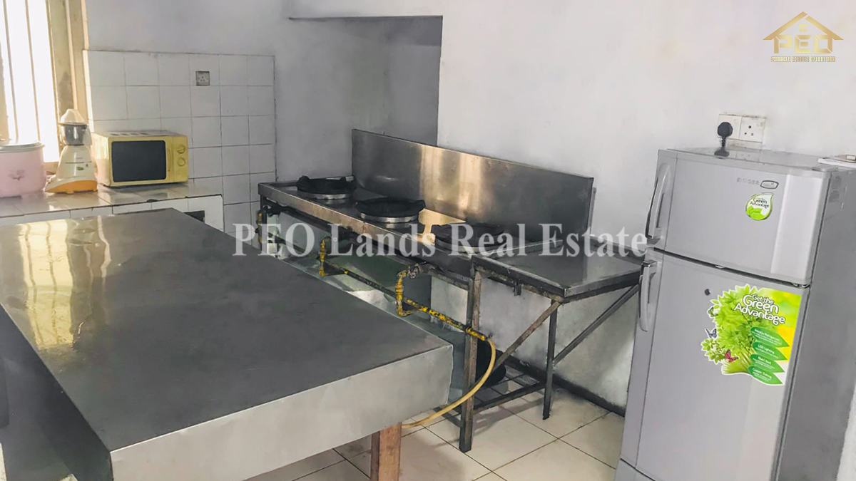 (DC479) Business land with property for sale in Colombo Road, Avissawella